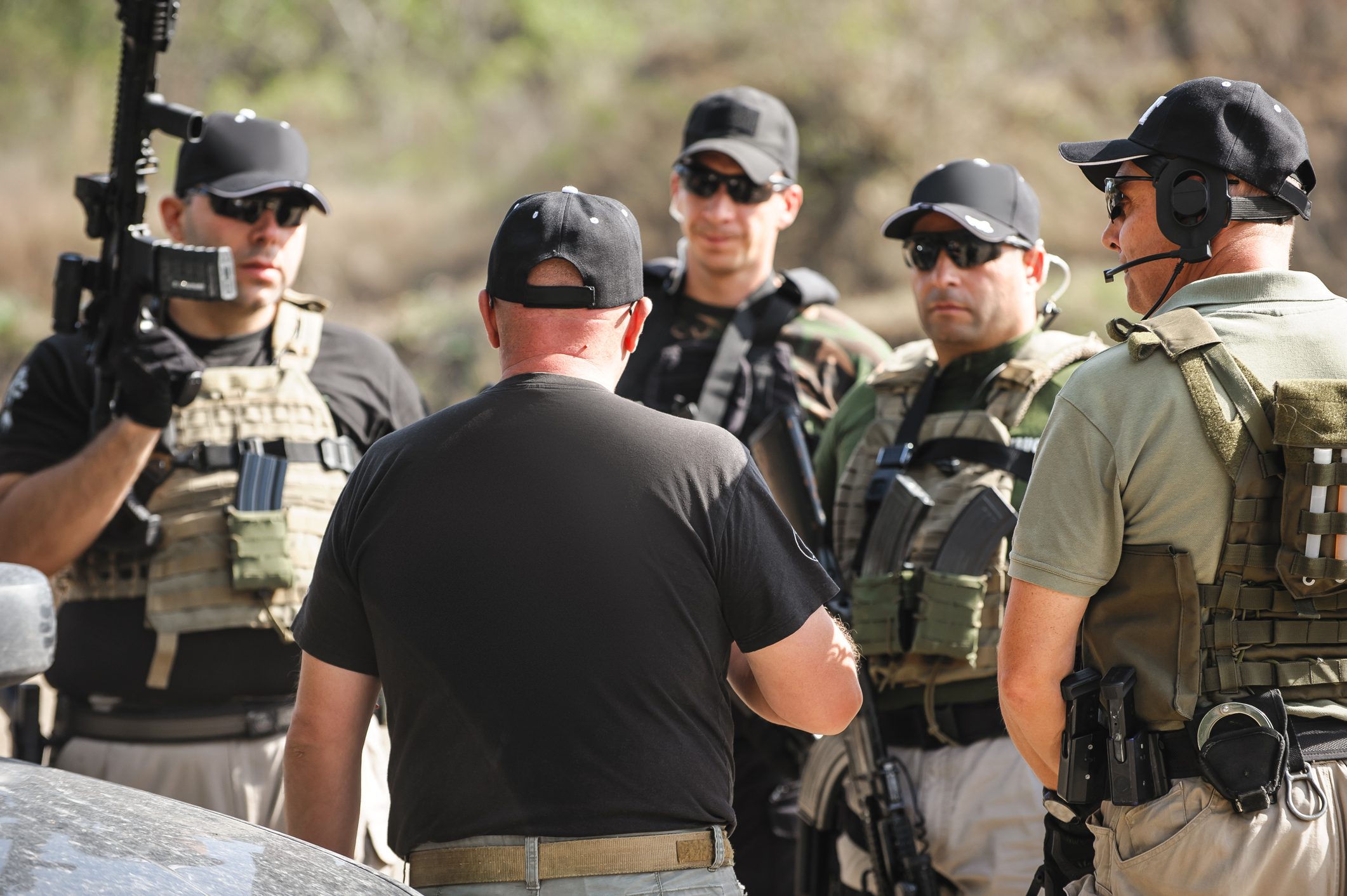 Armed team gathered for briefing